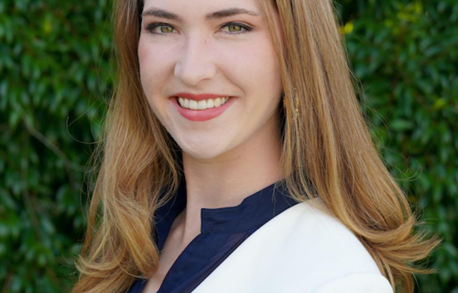 student Haley Mathews smiling outdoors 