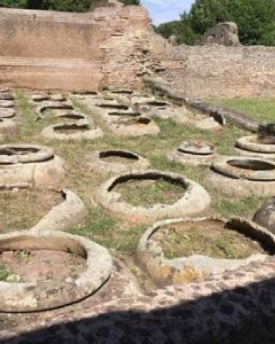 Roman wine storage jars at Ostia (Italy), Caseggiato dei Doli (I.IV.5). Photo by Astrid Van Oyen