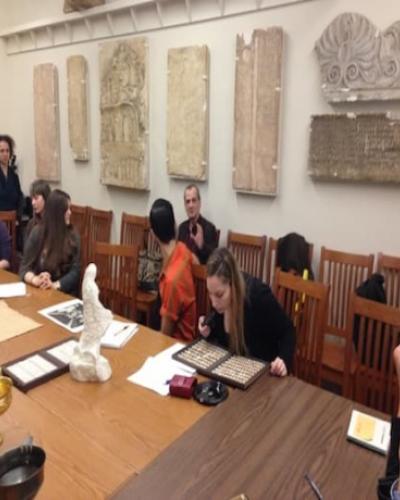 Students interacting with professor
